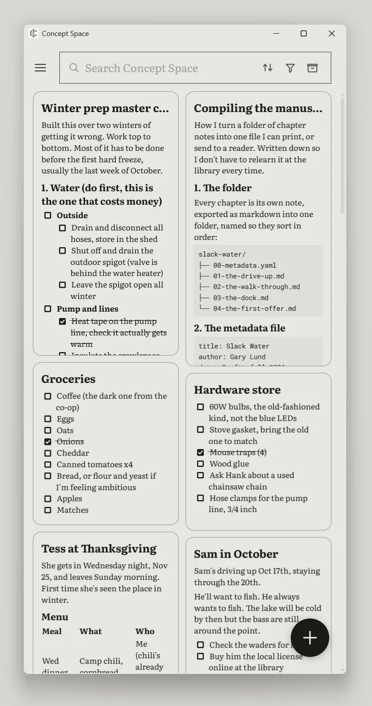 The same notes at phone width: two columns of cards under the search field, the new-note button at the bottom right.